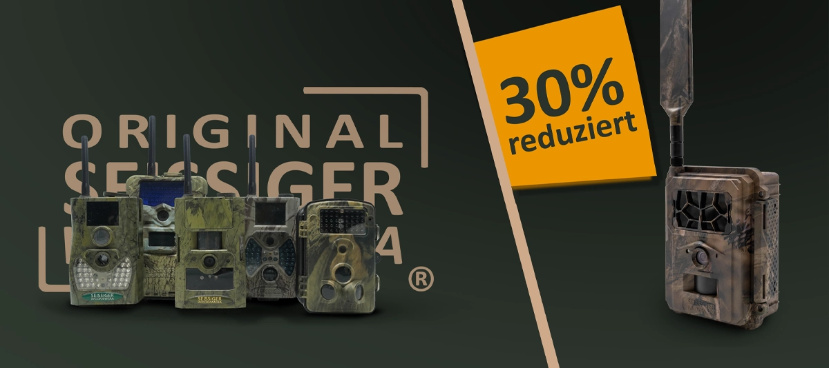 Links fünf ältere Seissiger Wildkameramodelle in Tarnfarben, rechts ein neues Seissiger Wildkameramodell in Tarnoptik, schräge Trennlinie dazwischen, oberes rechtes orangefarbenes Rechteck mit ‚30% reduziert‘, Hintergrund mit heller Aufschrift ‚ORIGINAL S